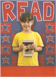 Child holding Heaven for Kids by Randy Alcorn