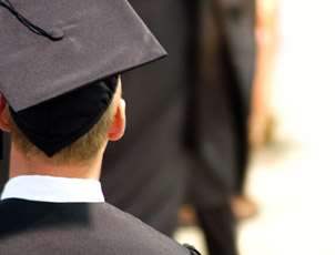Graduate looking on