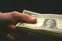 handing money