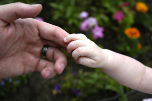 holiding child's hand