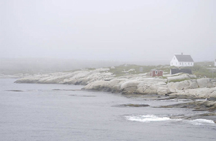 house on foggy coast