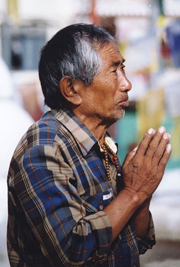 Man from Nepal praying