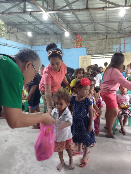 Children receiving gifts