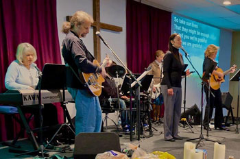 John Kohlenberger leading worship