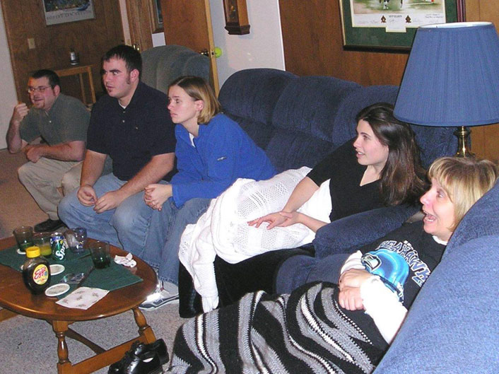 Nanci and kids watching football