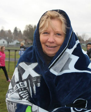 Nanci in a Seahawks blanket