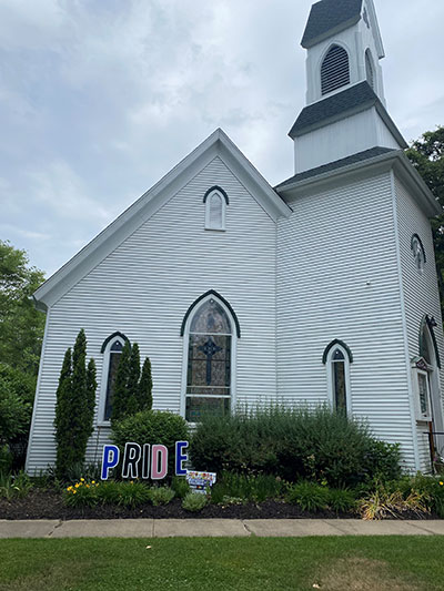 Church displaying Pride sign